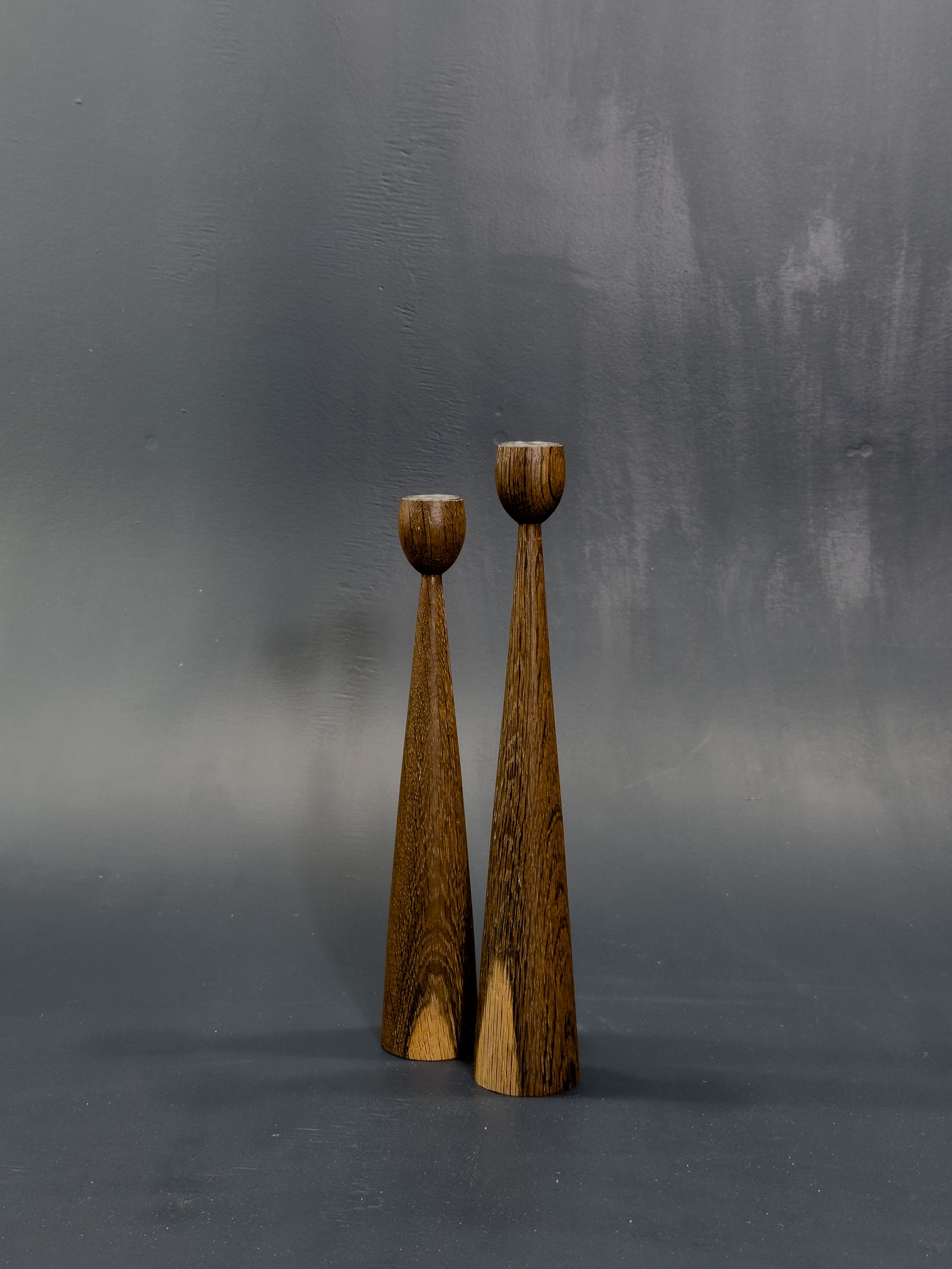 Pair of Stained Oak Candlesticks