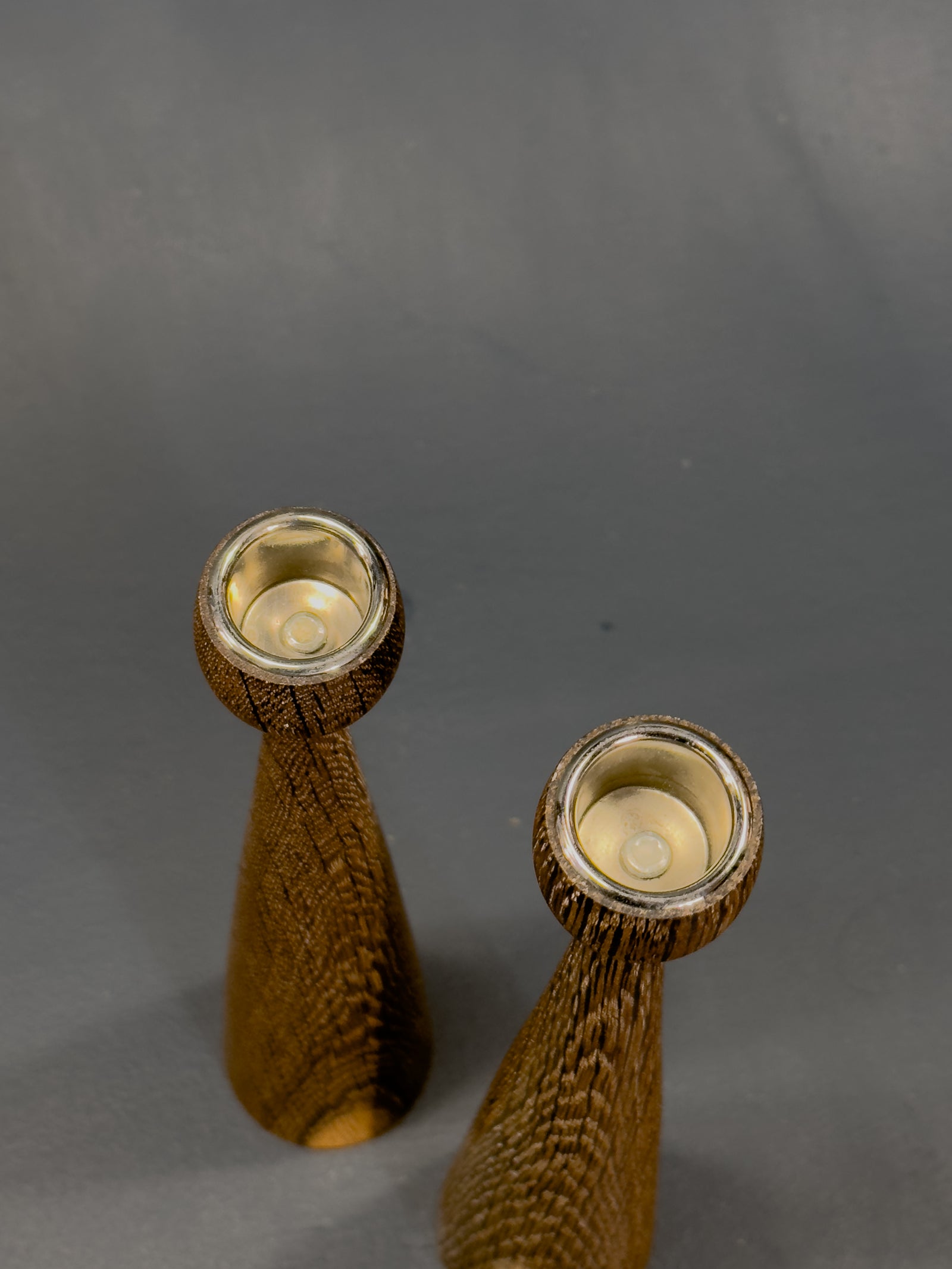 Pair of Stained Oak Candlesticks